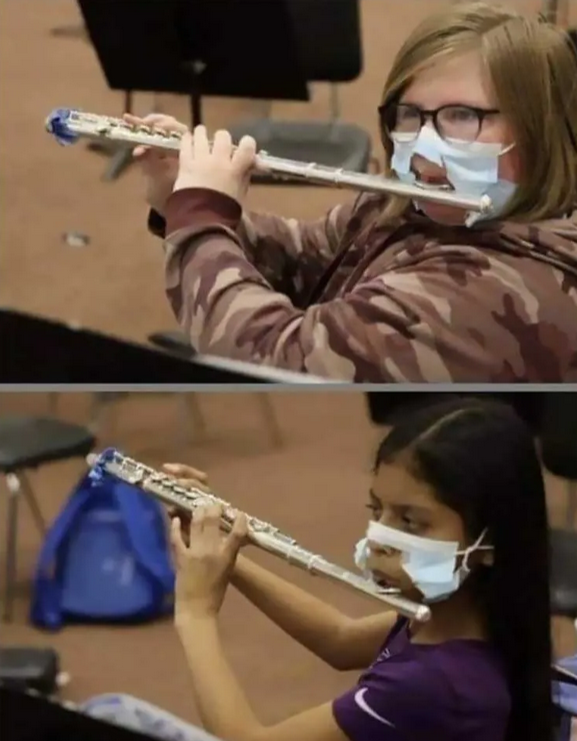 Ein Bild, das Musik, Person, Holzblasinstrument, Kleidung enthält.
Automatisch generierte Beschreibung